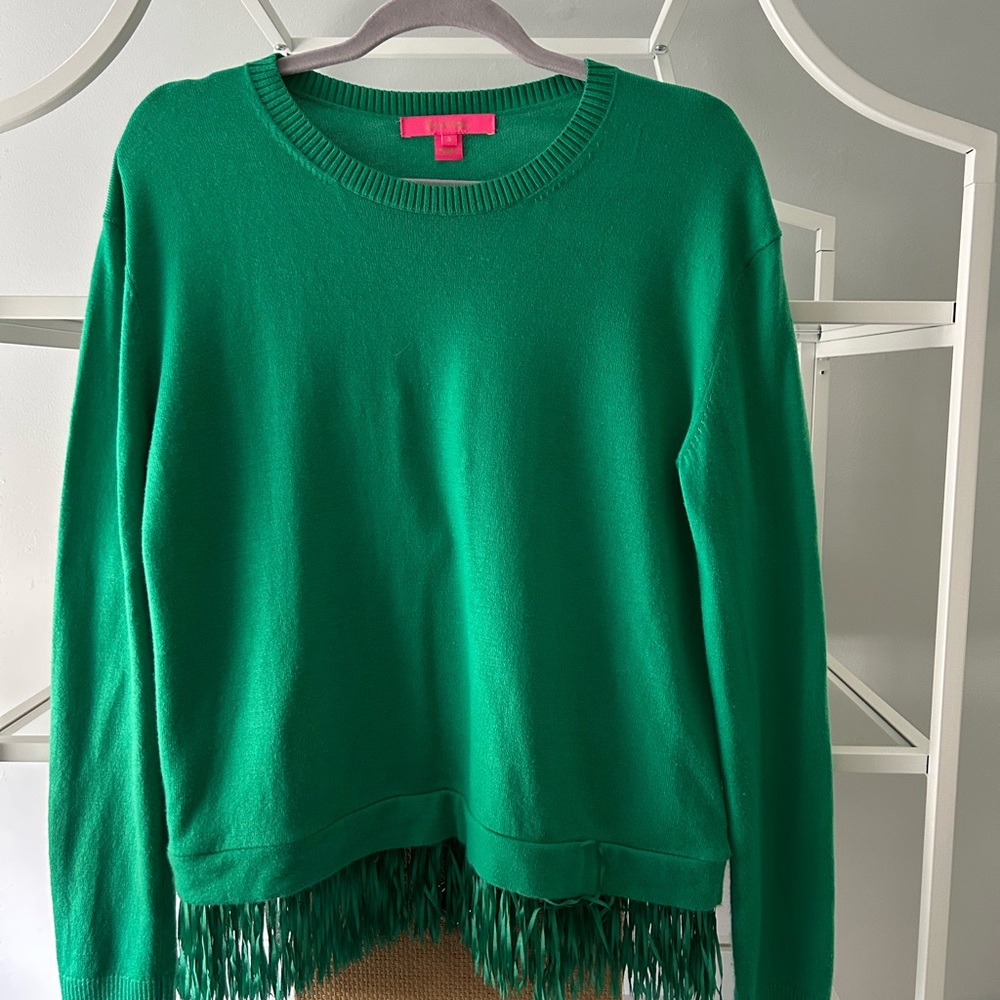 Such a simple but fun sweater! The fringe just makes it!